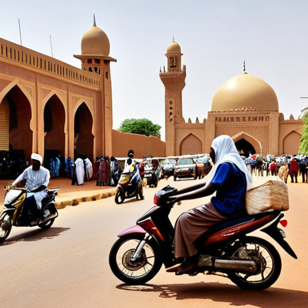 **

A bustling street scene in Niamey, Niger. Focus on the chaotic but vibrant atmosphere: Yellow "kabu-kabu" motorcycle taxis weaving through traffic near a landmark like the Grand Mosque. Include pedestrians, street vendors, and a sense of the city's energy. Capture the challenge of navigating a city without clear street grids.

**