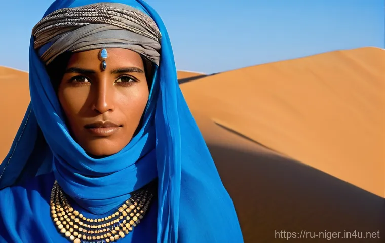 니제르 부족별 특징 - **Tuareg People: The Blue Nomads**
"A captivating portrait of a proud Tuareg man and woman in th...